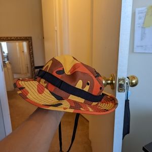 Orange camo bucket hat with chin strap